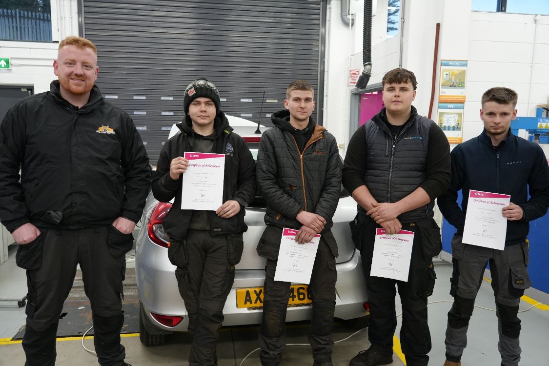 Ben McKeating, with SERC Level 3 Apprenticeship NI in Vehicle Maintenance & Repair (Light Vehicle) apprentices Conaire Small, Ethan Boyd, Callum McGoldrick, and Ben Norrie (24, Cloghy).